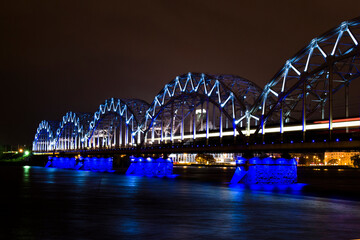 Riga's main railroad bridge at night