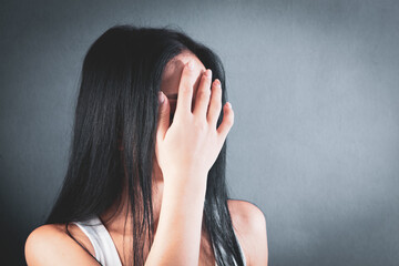 Fototapeta premium girl covering her face with her hands