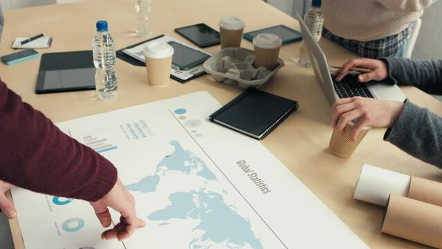 Global statistics, map and business hands in marketing meeting collaboration, planning strategy for advertising agency. Worldwide, global and map design planner team for company online website target