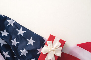 Fototapeta na wymiar United States election design concept, American Flag over white table background with gift.