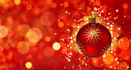 Christmas red ball with gold stars on festive background. Christmas ornaments and New Year decor.