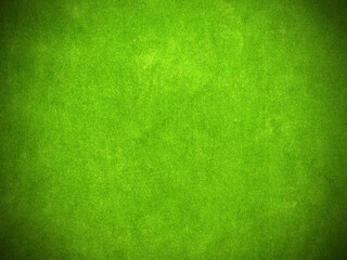 green velvet fabric texture used as background. Empty green fabric background of soft and smooth...