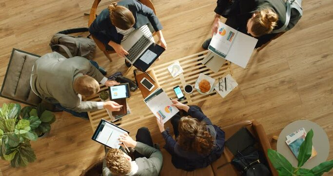 Working, team business meeting and graph logistics strategy of marketing teamwork in a office. Top view of staff, advertising and work group collaboration on a project planning job schedule data