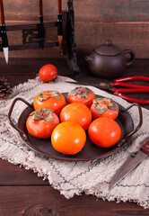 The fresh fruit of autumn, red persimmon