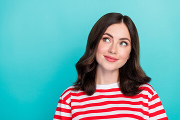 Fototapeta premium Closeup photo of young pretty cute woman wear striped red t-shirt dreamy wavy hair look interested empty space isolated on cyan color background