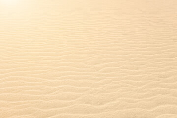 Fototapeta na wymiar Close up on Beach Sand texture background for wallpaper and poster. Sandy beach. Side Top view. Banner