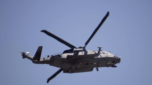 Close Up View of the Sikorsky H-92 Military Helicopter Flying By SLOMO