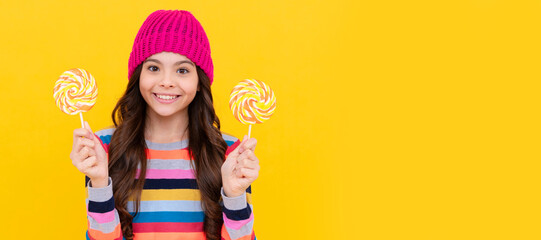 cheerful teen girl with lollipop candy. Teenager child with sweets, poster banner header, copy...