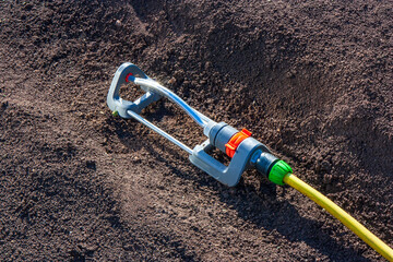 Equipment for watering garden. Closeup of a automatic sprinkler for irrigation of lawn or grass....