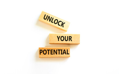 Unlock your potential symbol. Concept words Unlock your potential on wooden blocks. Beautiful white...
