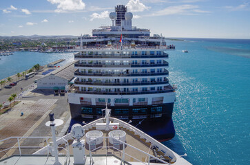 Huge modern HAL cruiseship or cruise ship liner Koningsdam in port during Caribbean cruising dream...