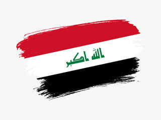 Iraq flag made in textured brush stroke. Patriotic country flag on white background