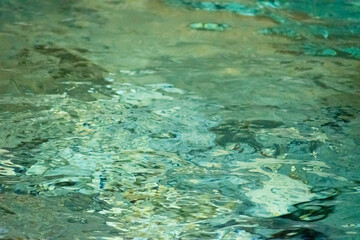 Fototapeta na wymiar clear turquoise water surface 2