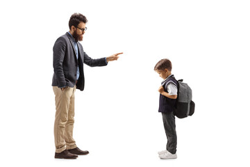 Full length shot of a man scolding a schoolboy