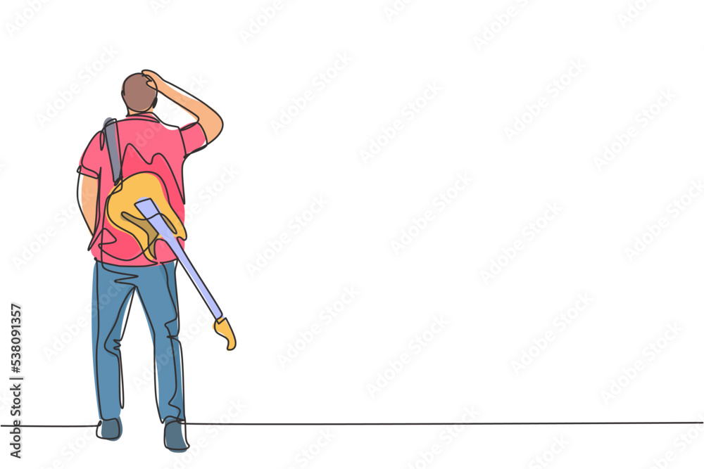 Wall mural One continuous line drawing of young happy male rock guitarist walking while carrying electric guitar on his shoulder. Musician artist concept single line draw design graphic vector illustration - Wall murals