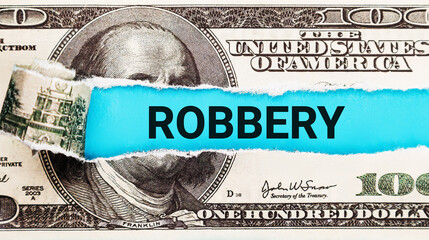 Robbery. The word robbery on dollar usa background. Theft and stealing money concept. The concept...