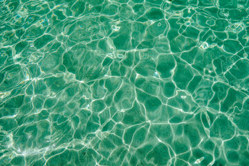 Fototapeta na wymiar Blue clear water sea ocean. Sandy bottom. Sun lights. High quality photo