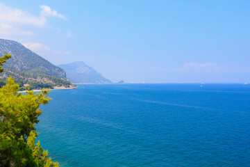 Very beautiful rocky Turkish Mediterranean coast in Beldibi district of Kemer, Antalya province in Turkey