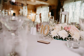 Waiting for guest,table elegance set. Table decoration with flowers.