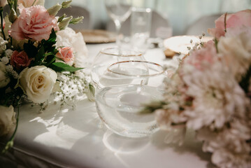 Waiting for guest,table elegance set. Table decoration with flowers.