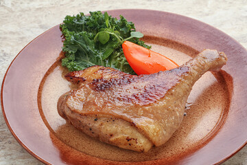 Roasted duck leg with orange sauce