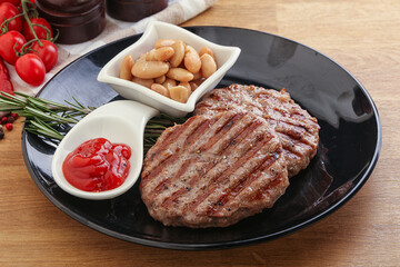 Grilled beef burger cutlet with sauce