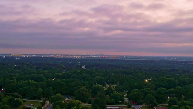 Aerial Hyperlapse Sunrise Very Cloudy Flying To Atlanta With The Airport.