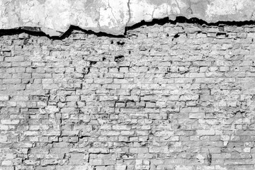 Old destroyed brick vintage wall. Unusual building background.