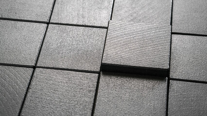 Black wooden cubes background