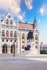 BUDAPEST, HUNGARY - JULY 20, 2022: Equestrian statue of Gyula Andr&aacute;ssy at Lajos Kossuth Square in front of the Hungarian Parliament in Budapest, Hungary