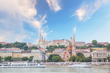 Obraz premium A stark view of the Fishermen's Bastion, the Church of St. Matthias, the Calvinist Church on the Danube Embankment in Budapest, Hungary