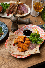 trout skewers on a plate in a restaurant