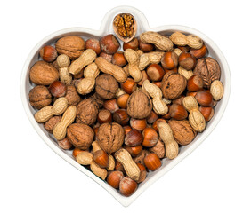 White heart shaped bowl with dried fruit mix (peanuts, walnuts, hazelnuts), isolated on white or transparent background, Photography, png.