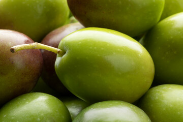 Fresh raw green olives close up full frame as background