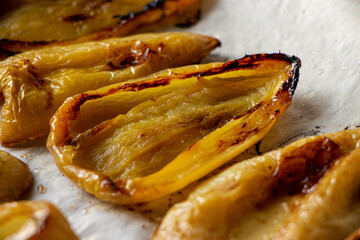 roasted bell pepper food healthy on baking tray, baked peppers, yellow and red pepperoni. Vegetable ingredients for healthy dinner or lunch. Seasoning peppers, autumn cousine