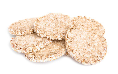 Many crunchy buckwheat cakes on white background