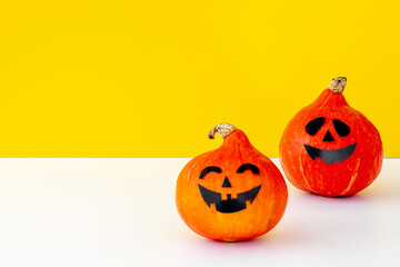 Festive Halloween pumpkin ghosts heads. Halloween greeting card