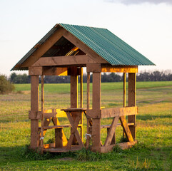 Wooden gazebo in the park.