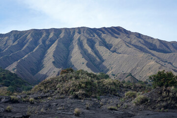 Mount Widodaren is located close to Mount Bromo and Mount Batok. Unique textured mountain surrounded by a sea of sand.           