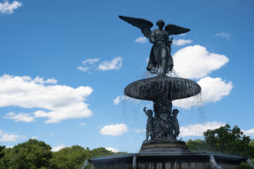 Bethesda Fountain (Angel of the Waters) in Central Park, designed by Emma Stebbins (1868), on a sunny summer day