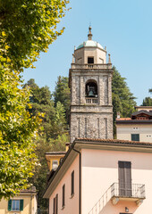 Naklejka premium View of the bell tower of the San Giacomo church in Bellagio, on Lake Como, Lombardy, Italy
