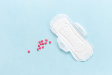 Fototapeta na wymiar Menstrual cycle and protection concept with white pad, top view