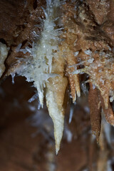 Crystals on speleothemes in a cave