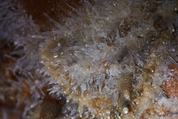 Crystals on speleothemes in a cave