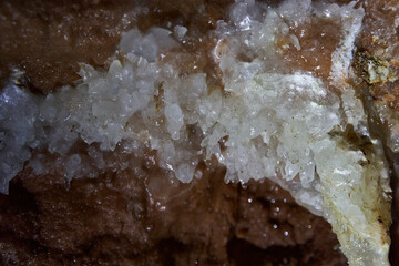 Crystals on speleothemes in a cave