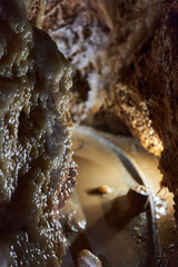 Crystals on speleothemes in a cave
