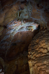 Crystals on speleothemes in a cave
