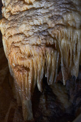 Crystals on speleothemes in a cave