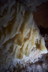 Crystals on speleothemes in a cave