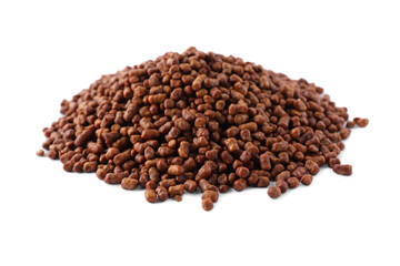Pile of buckwheat tea granules on white background